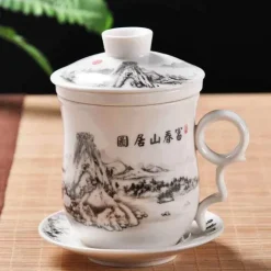 Blau-weiße Teetasse aus Porzellan mit Deckel und Filter