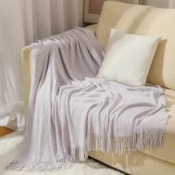 Chenille-Strickdecke – weicher, kühlender Sofabezug mit Quasten am Bettende