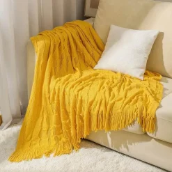 Geometrische Strickdecke - Gemütliche Wohndekoration