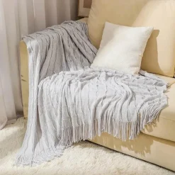 Geometrische Strickdecke - Gemütliche Wohndekoration