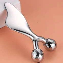 Gesichtsmassagegerät Gua Sha Kaltroller Haut, Straffungs- und Modellierwerkzeug