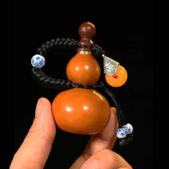 Glücksbringer-Schlüsselanhänger - Tragbare Amulettflasche