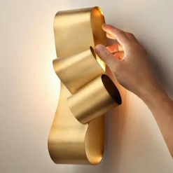 Goldene Wandleuchte – Elegante Dekobeleuchtung