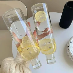 Hitzebeständige Glaswasserflasche - Stilvolles Zeitskalen-Design