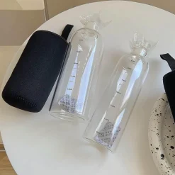 Hitzebeständige Glaswasserflasche - Stilvolles Zeitskalen-Design