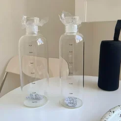 Hitzebeständige Glaswasserflasche - Stilvolles Zeitskalen-Design