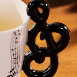 Kaffeetasse mit Musiknoten – kreative Teetasse aus Keramik