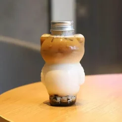 Katzen-Getränkeflasche, umweltfreundlich, im Cartoon-Stil, Trinkbegleiter