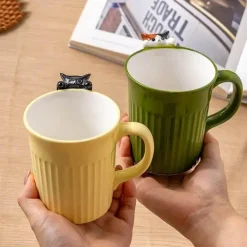 Keramiktasse mit Katzenmotiv – süße Kaffeetasse mit Klettertier