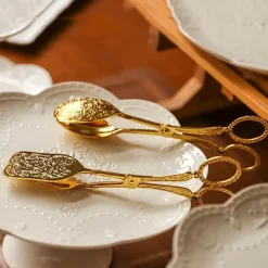 Kuchenzange aus Edelstahl – geprägtes Backutensil