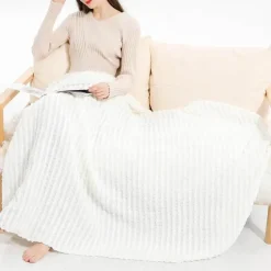 Kuschelige nordische Strickdecke – Überwurf mit Quasten für Zuhause und unterwegs