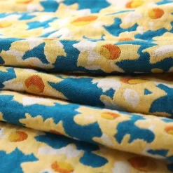 Nordische Blumendecke - Weiche Sommerdeko aus Baumwolle