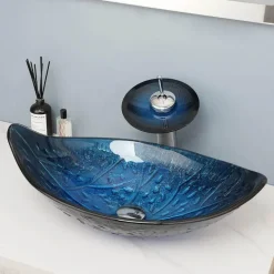 Ovales Aufsatzwaschbecken aus gehärtetem Glas mit Wasserfall-Wasserhahn-Kombination