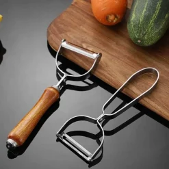 Schäler und Reibe aus Edelstahl – Multifunktionswerkzeug für müheloses Zubereiten von Obst und Gemüse