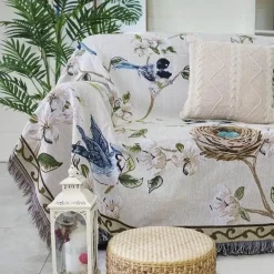 Strickdecke mit Blumen und Vögeln – Moderne Winterdecke