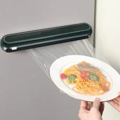 Wandmontierter Plastikfolienspender Automatischer Küchenorganizer