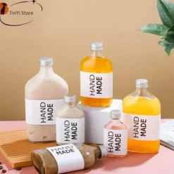 Wiederverwendbare Getränkeflaschen aus klarem Glas – perfekt zum Entsaften von Smoothies, Kombucha, Tee, Milch und Wein