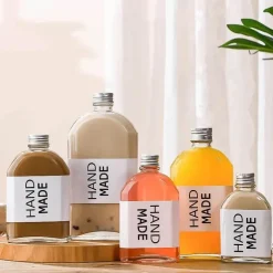 Wiederverwendbare Getränkeflaschen aus klarem Glas – perfekt zum Entsaften von Smoothies, Kombucha, Tee, Milch und Wein